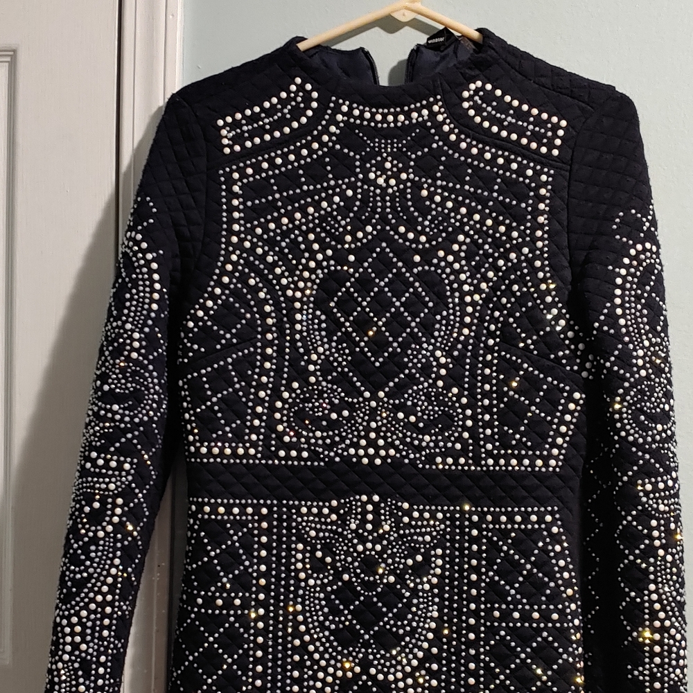 Black size M cocktail or party dress.
